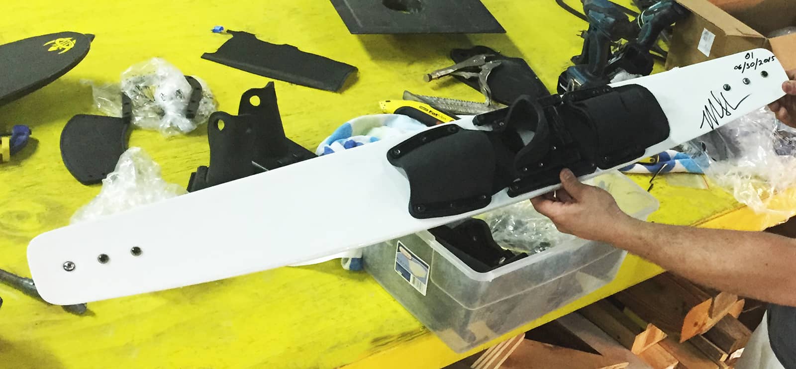 white slalom ski being held after final production.