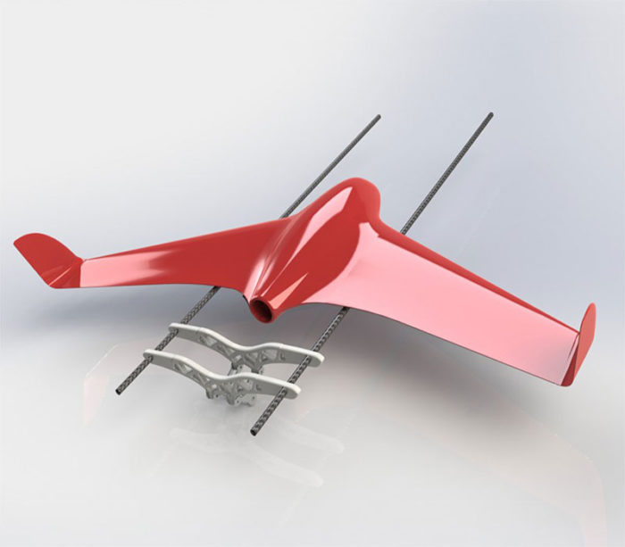 CAD rendering of red autonomous fixed wing drone.