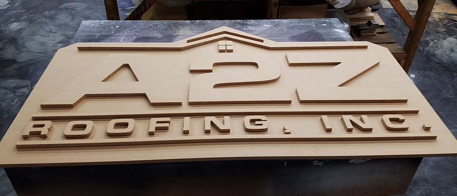 3D sign made out of wood for a local business A2Z roofing, inc.