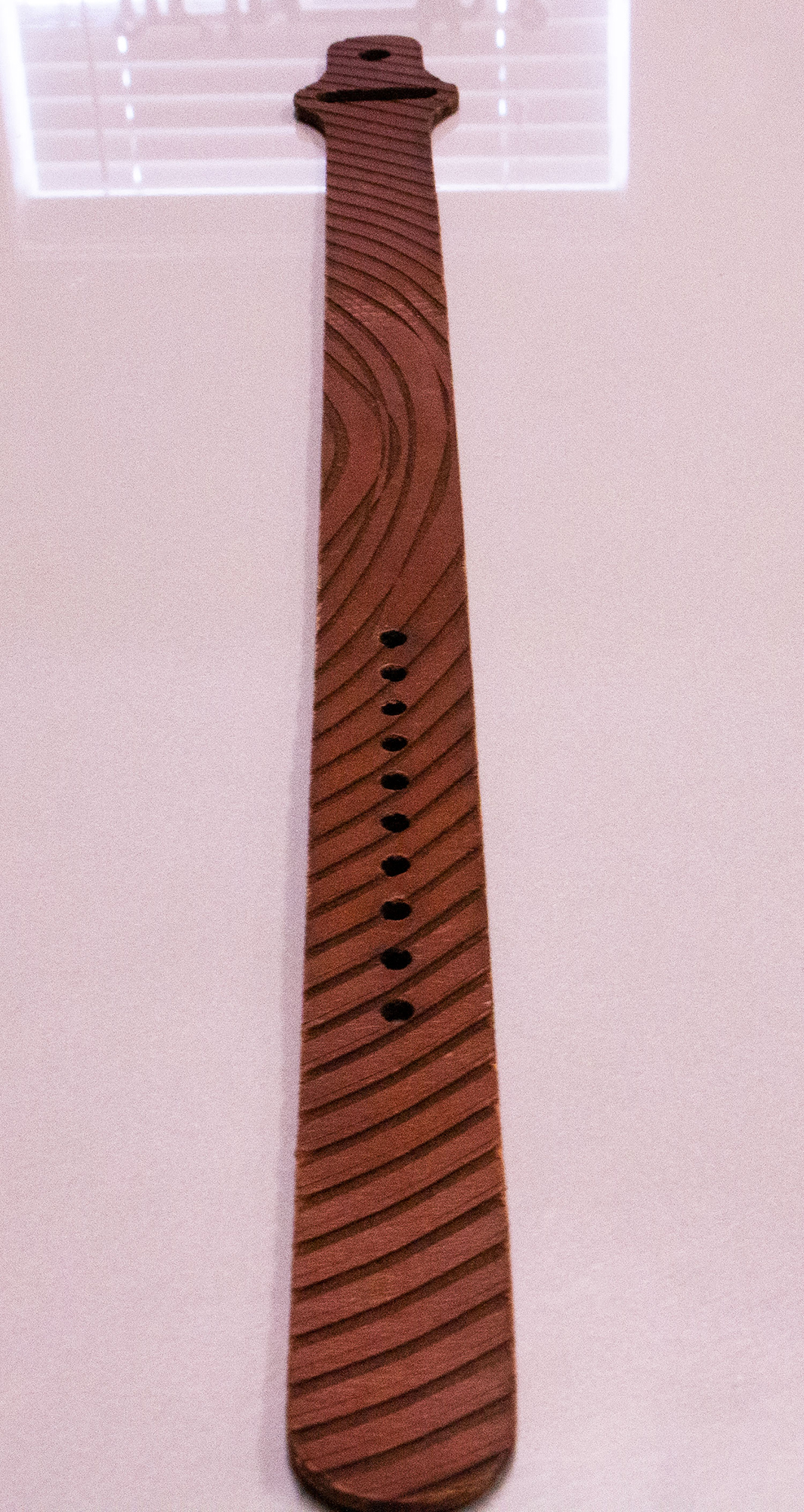 leather watch band that was laser cut with laser patterns on it.