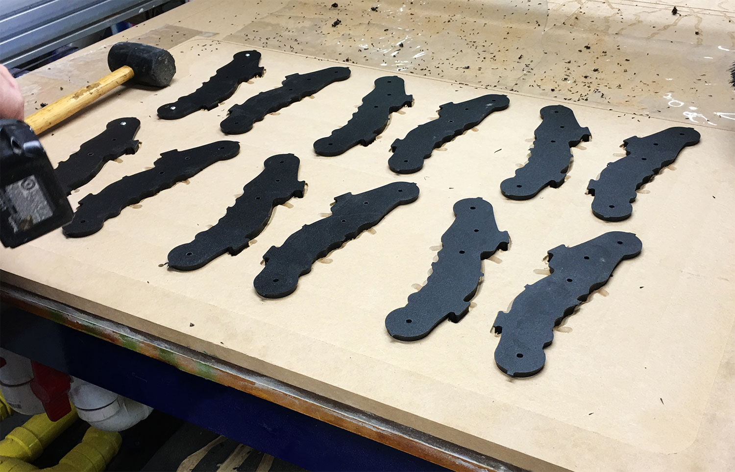 custom fabricated black handles for a project after being cnc cut togehter.