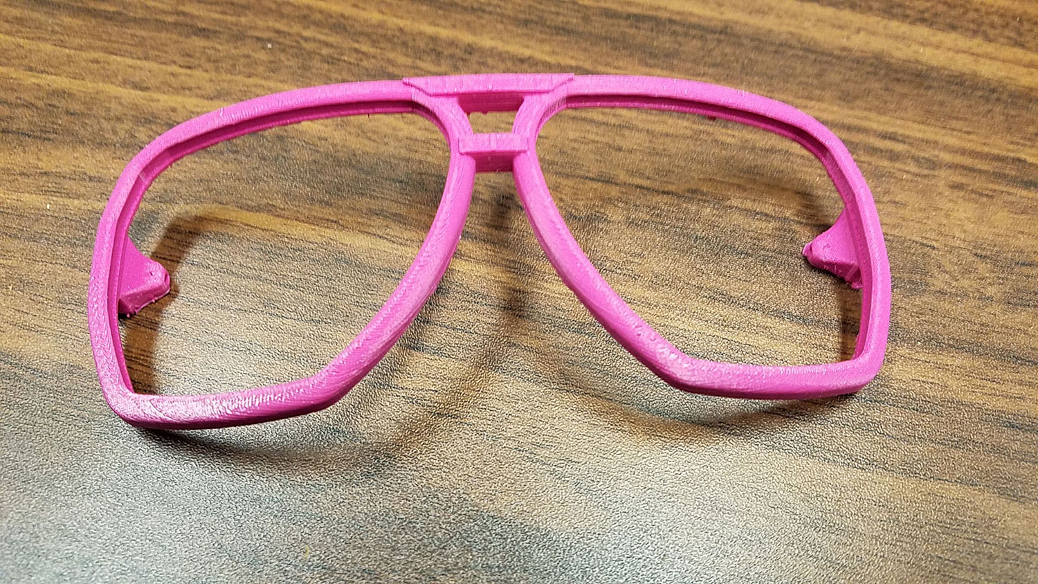 3d printed pink frame for sunglasses.
