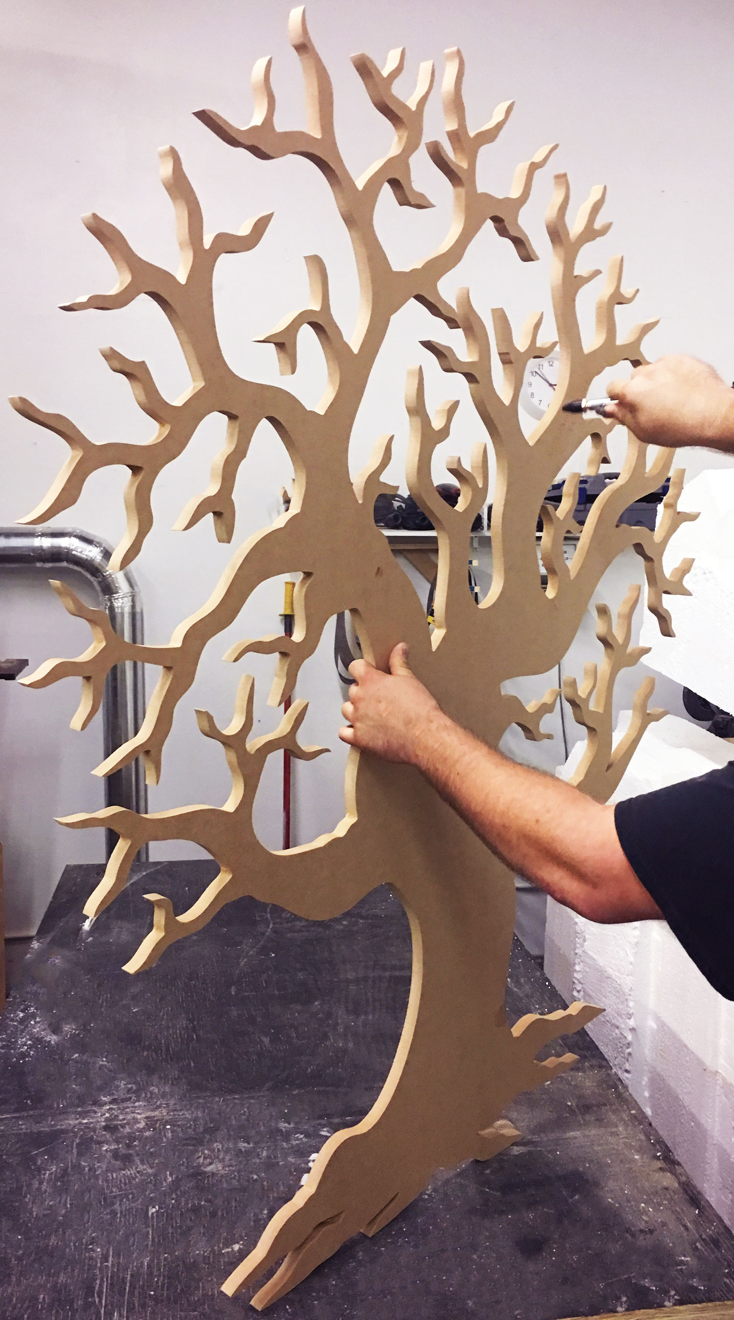 tree cut out of wood from cnc machine