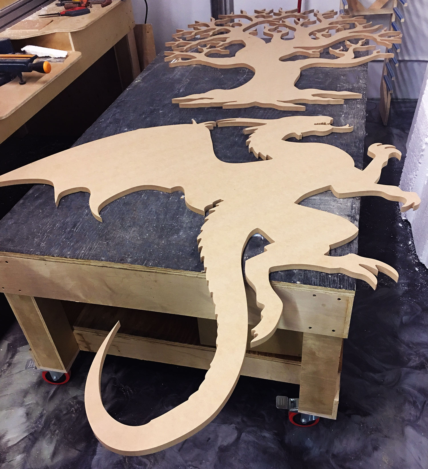 custom cut dragon and tree out of wood