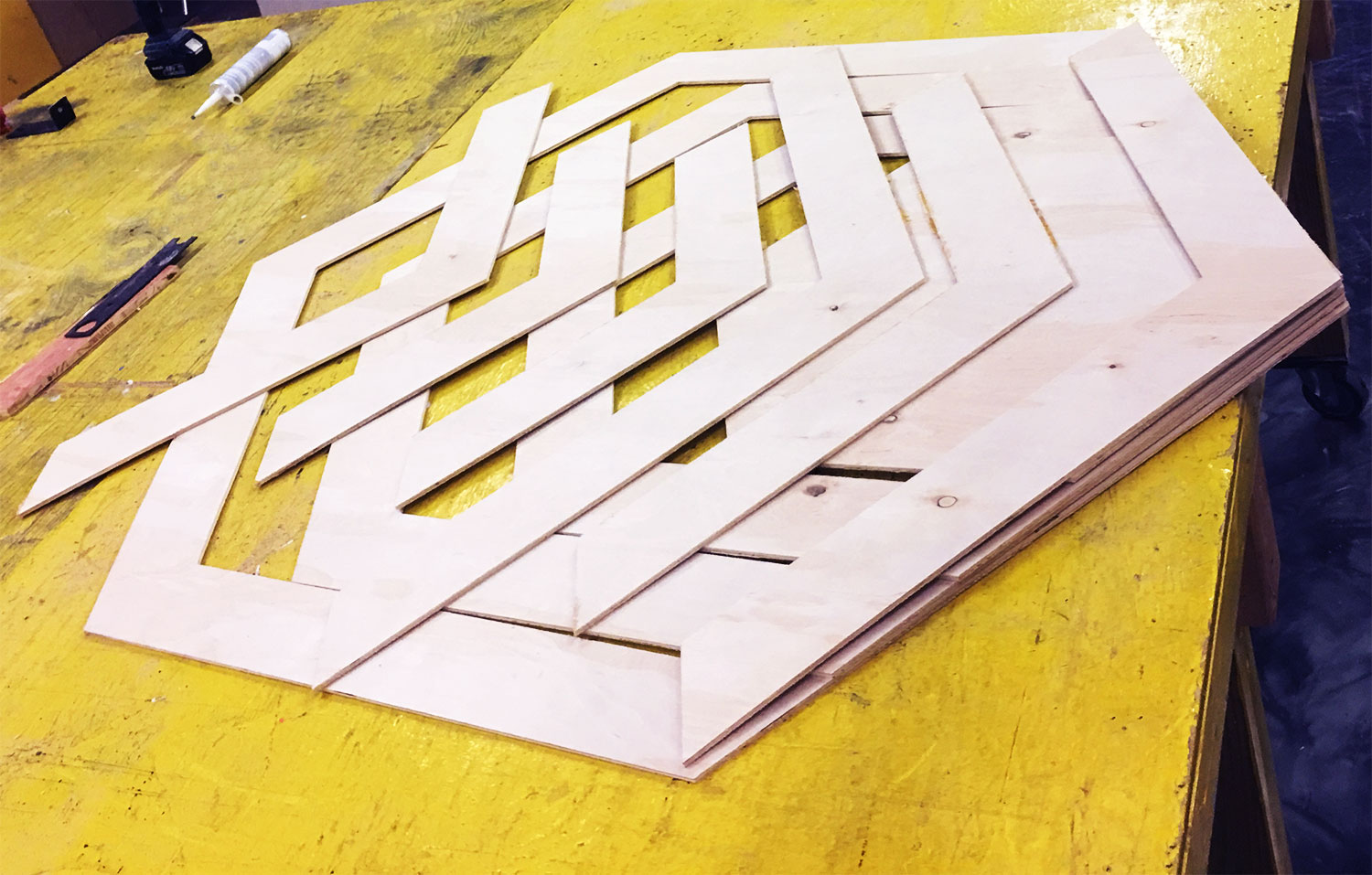 custom cut shapes out of wood to create design pattern