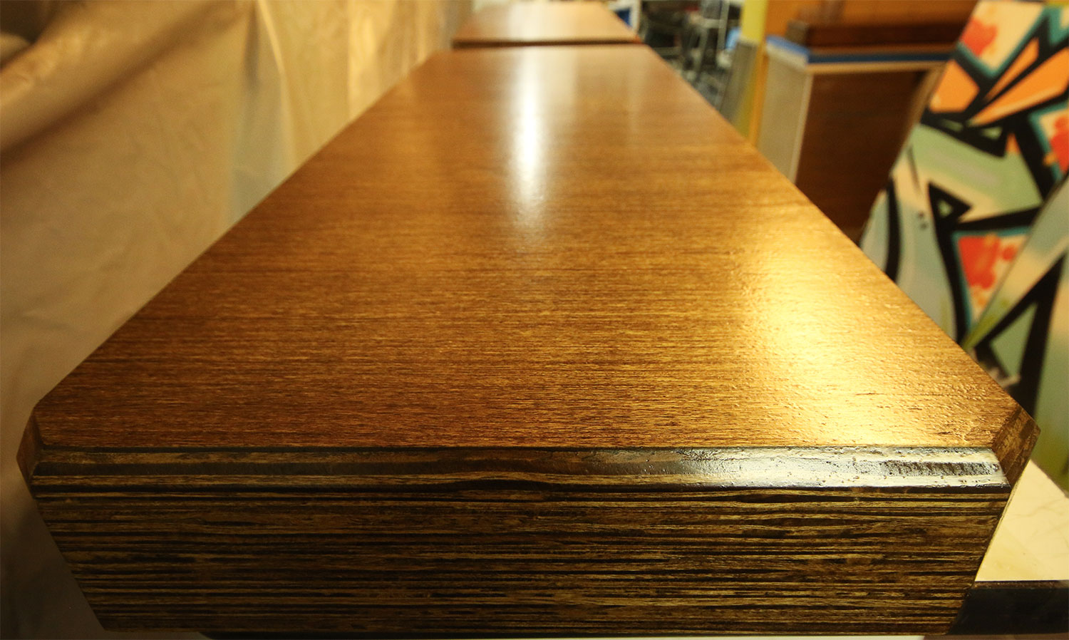 close up of wooden steps laying out to dry after being stained.