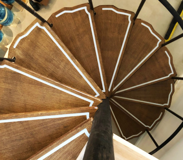 overhead view of winding wooden stair.